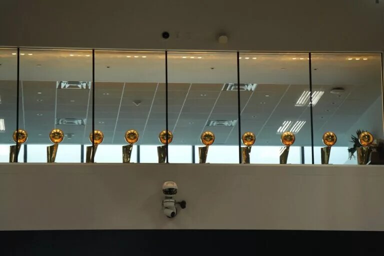 Sep 30, 2024; El Segundo, CA, USA; Los Angeles Lakers NBA Larry O‚ÄôBrien Championship trophies at the UCLA Health Training Center. Mandatory Credit: Kirby Lee-Imagn Images