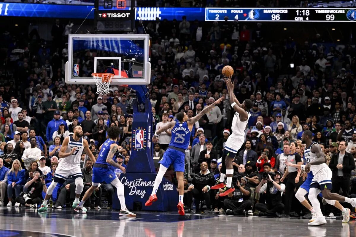 Minnesota Timberwolves guard Anthony Edwards (5) makes a basket against the Dallas Mavericks