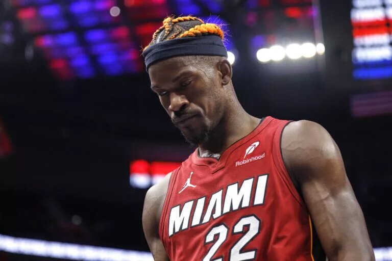 Dec 16, 2024; Detroit, Michigan, USA; Miami Heat forward Jimmy Butler (22) walks off the court after the game against the Detroit Pistons at Little Caesars Arena. Mandatory Credit: Rick Osentoski-Imagn Images