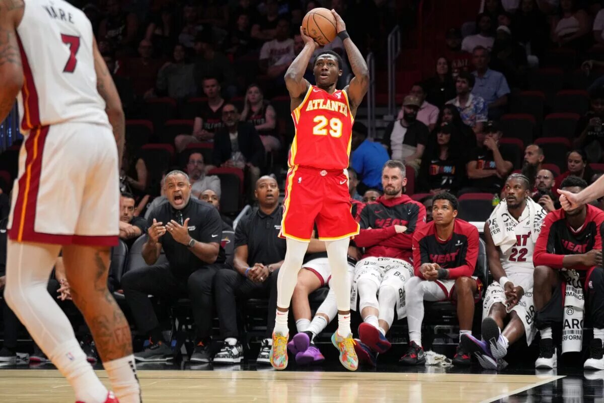 Atlanta Hawks guard Daeqwon Plowden (29) takes a three-point shot