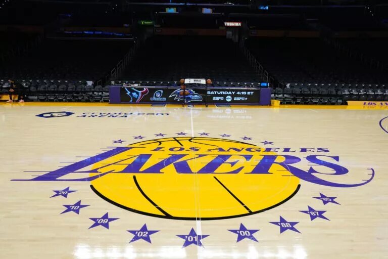 Jan 17, 2024; Los Angeles, California, USA; The Los Angeles Lakers logo at center court at the Crypto.com Arena. Mandatory Credit: Kirby Lee-USA TODAY Sports