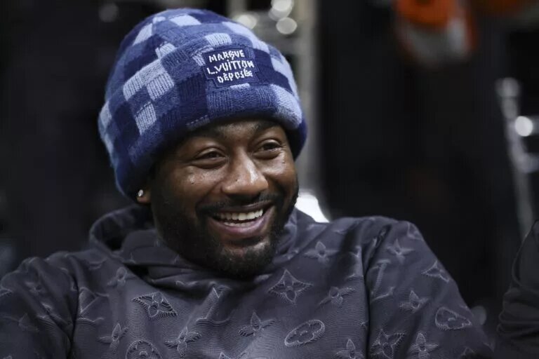 Jan 27, 2024; Coral Gables, Florida, USA; American professional basketball player John Wall attends the game between the Pittsburgh Panthers and the Miami Hurricanes at Watsco Center. Mandatory Credit: Sam Navarro-USA TODAY Sports