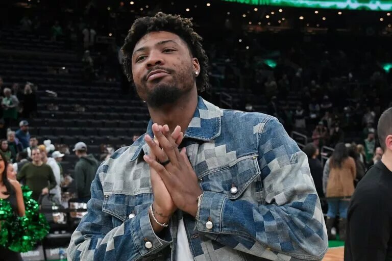 Feb 4, 2024; Boston, Massachusetts, USA; Memphis Grizzlies guard Marcus Smart (36) gestures to fans after a game against the Boston Celtics at TD Garden. Mandatory Credit: Eric Canha-USA TODAY Sports
