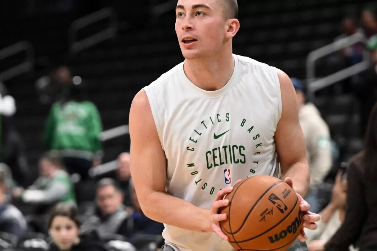 Dec 4, 2024; Boston, Massachusetts, USA; Boston Celtics guard Payton Pritchard (11) takes a shot before a game against the Detroit Pistons at the TD Garden. Mandatory Credit: Brian Fluharty-Imagn Images