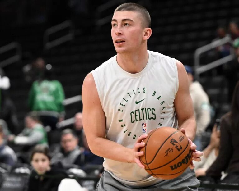 Dec 4, 2024; Boston, Massachusetts, USA; Boston Celtics guard Payton Pritchard (11) takes a shot before a game against the Detroit Pistons at the TD Garden. Mandatory Credit: Brian Fluharty-Imagn Images