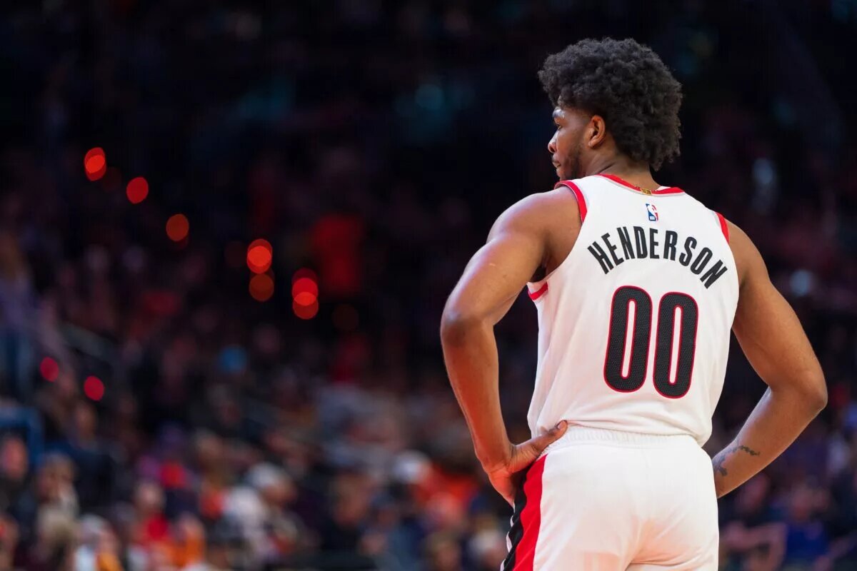 Portland Trail Blazers guard Scoot Henderson (G) watches on between plays in the first half during a game during a game against the Phoenix Suns at Footprint Center.