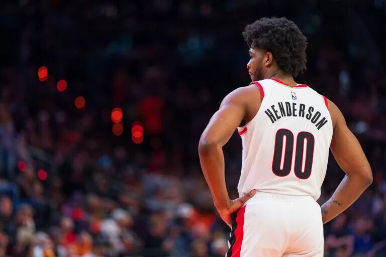 Portland Trail Blazers guard Scoot Henderson (G) watches on between plays in the first half during a game during a game against the Phoenix Suns at Footprint Center.