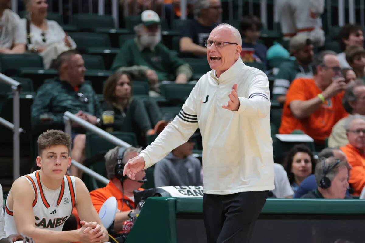 Dec 21, 2024; Coral Gables, Florida, USA; Miami Hurricanes head coach Jim Larranaga reacts from the sideline against the Mount St. Mary's Mountaineers during the second half at Watsco Center. Mandatory Credit: Sam Navarro-Imagn Images
