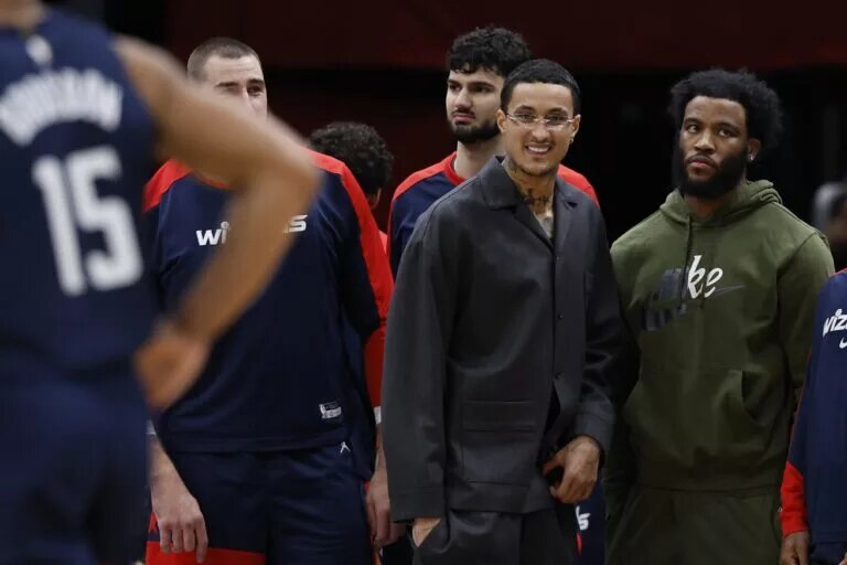 Washington Wizards forward Kyle Kuzma and Saddiq Bey out with injury on sideline