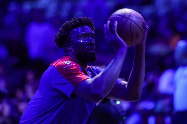 Philadelphia 76ers center Joel Embiid (21) warms up before the game