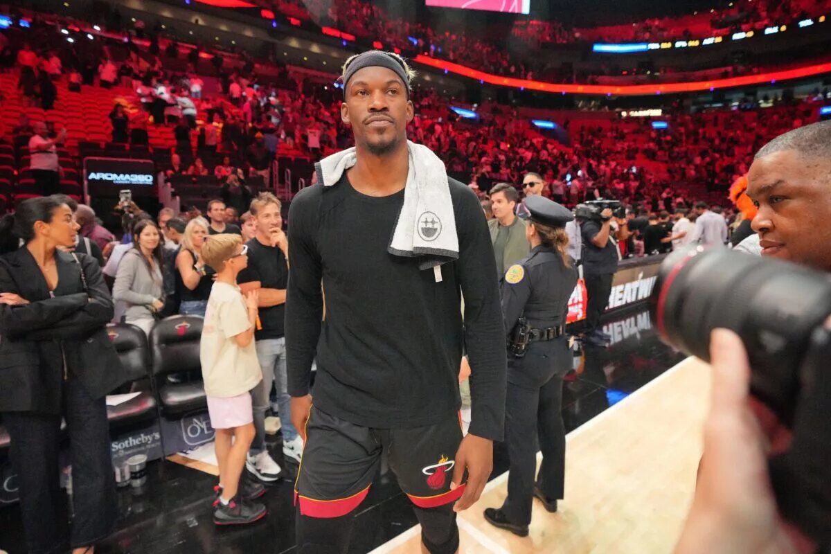 Miami Heat forward Jimmy Butler (22) walks off the court