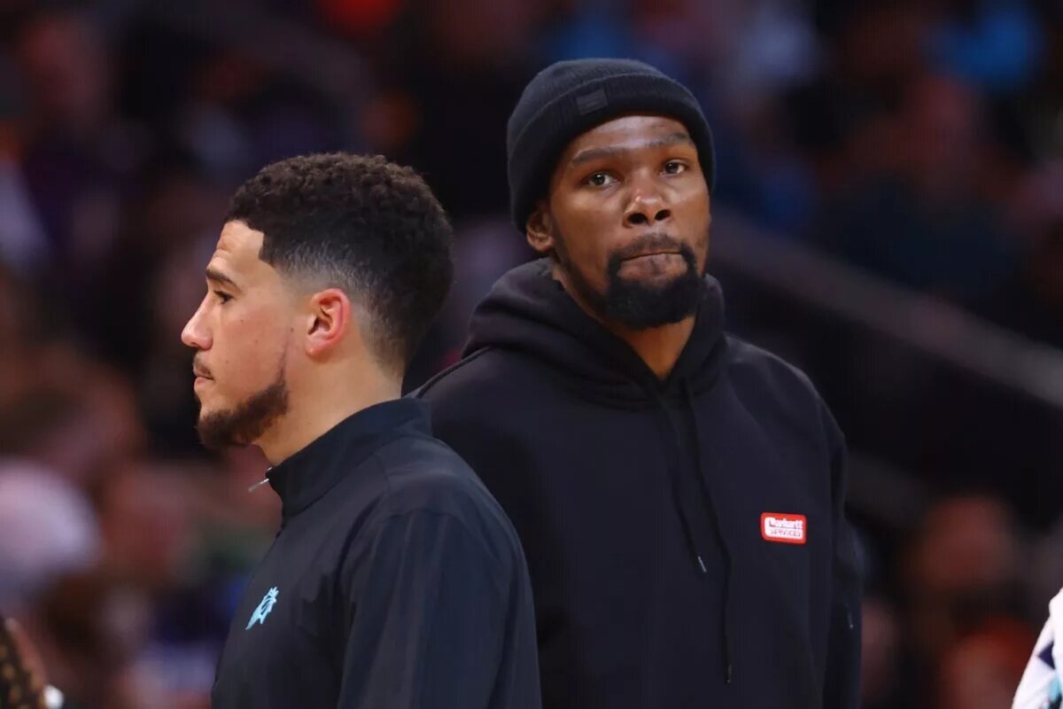 Feb 24, 2023; Phoenix, Arizona, USA; Phoenix Suns forward Kevin Durant (right) and guard Devin Booker against the Oklahoma City Thunder in the first half at Footprint Center. Mandatory Credit: Mark J. Rebilas-USA TODAY Sports