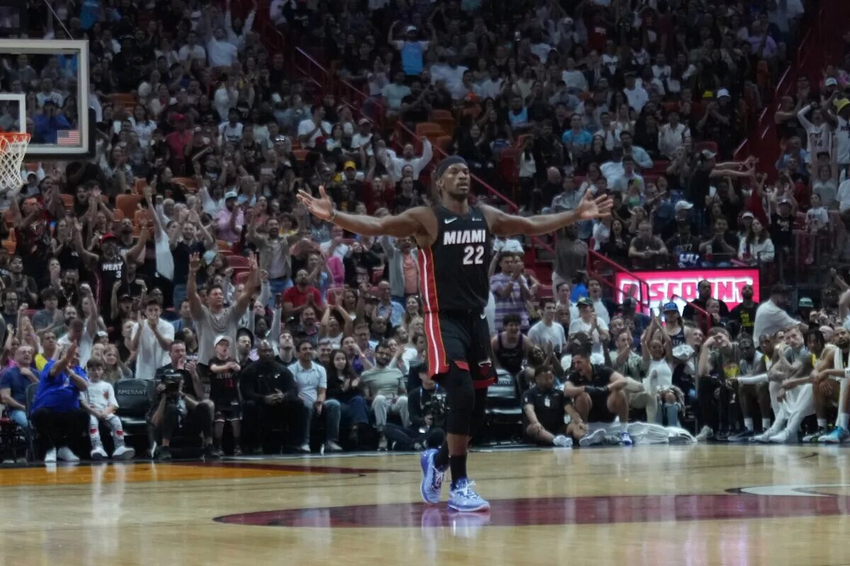 Mar 2, 2024; Miami, Florida, USA; Miami Heat forward Jimmy Butler (22) celebrates as the Heat pull away late in the fourth period at Kaseya Center. Mandatory Credit: Peter Joneleit-USA TODAY Sports