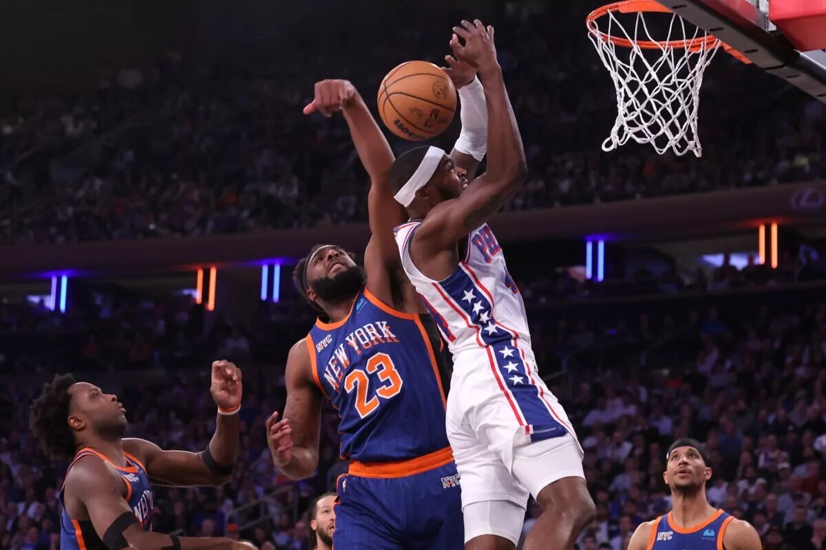 Apr 30, 2024; New York, New York, USA; New York Knicks center Mitchell Robinson (23) blocks a shot by Philadelphia 76ers forward Paul Reed (44) during the second quarter of game 5 of the first round of the 2024 NBA playoffs at Madison Square Garden. Mandatory Credit: Brad Penner-USA TODAY Sports