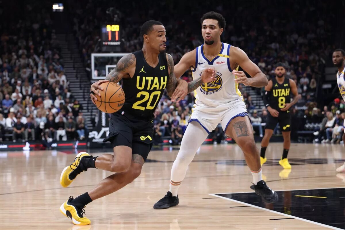 Golden State Warriors big man Trayce Jackson-Davis guards Utah Jazz big man John Collins