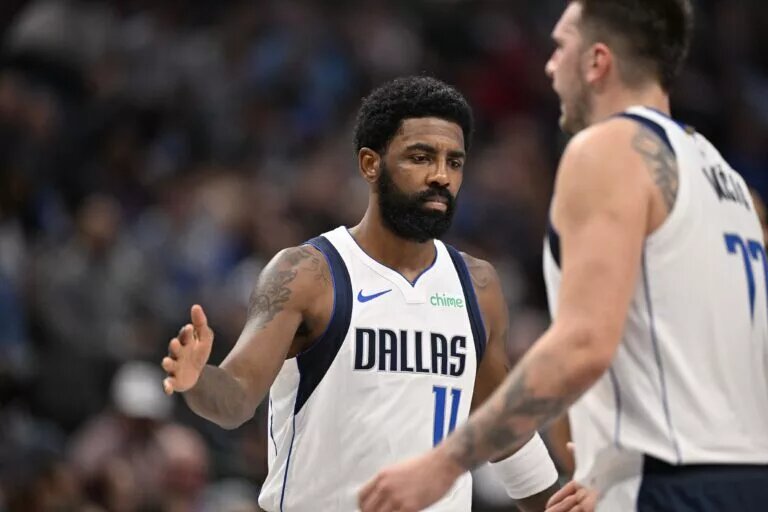 Nov 3, 2024; Dallas, Texas, USA; Dallas Mavericks guard Kyrie Irving (11) comes into the game to replace guard Luka Doncic (77) during the second half against the Orlando Magic at the American Airlines Center. Mandatory Credit: Jerome Miron-Imagn Images