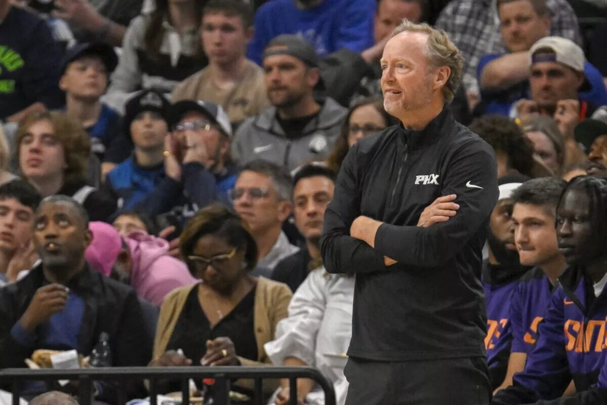 Phoenix Suns head coach Mike Budenholzer looks on against the Minnesota Timberwolves during the first quarter at Target Center.