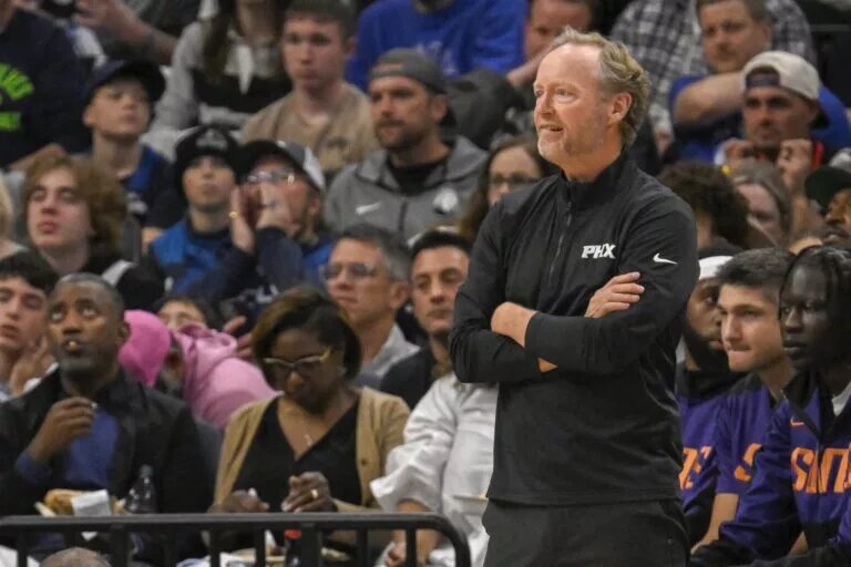 Phoenix Suns head coach Mike Budenholzer looks on against the Minnesota Timberwolves during the first quarter at Target Center.