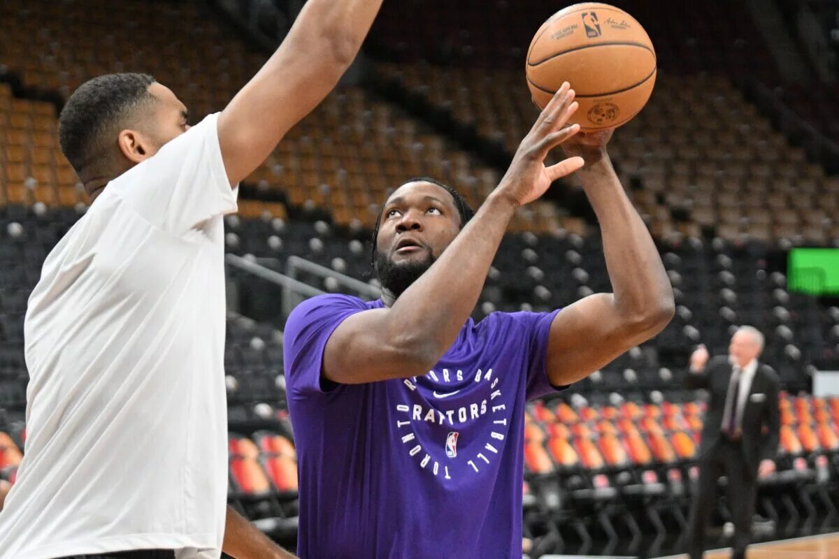 Nov 21, 2024; Toronto, Ontario, CAN; Toronto Raptors center Bruno Fernando (24) warms up before playing the Minnesota Timberwolves at Scotiabank Arena. Mandatory Credit: Dan Hamilton-Imagn Images