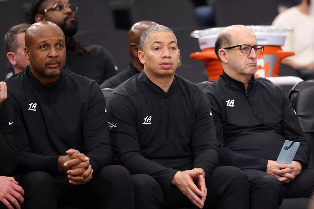 Dec 4, 2024; Inglewood, California, USA; Los Angeles Clippers head coach Tyronn Lue (center) and assistant coaches Brian Show (left) and Jeff Van Gundy (right) watch from the bench during the second half against the Minnesota Timberwolves at Intuit Dome.