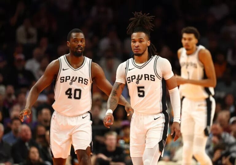 Dec 3, 2024; Phoenix, Arizona, USA; San Antonio Spurs forward Harrison Barnes (40) and guard Stephon Castle (5) against the Phoenix Suns during an NBA Cup game at Footprint Center.