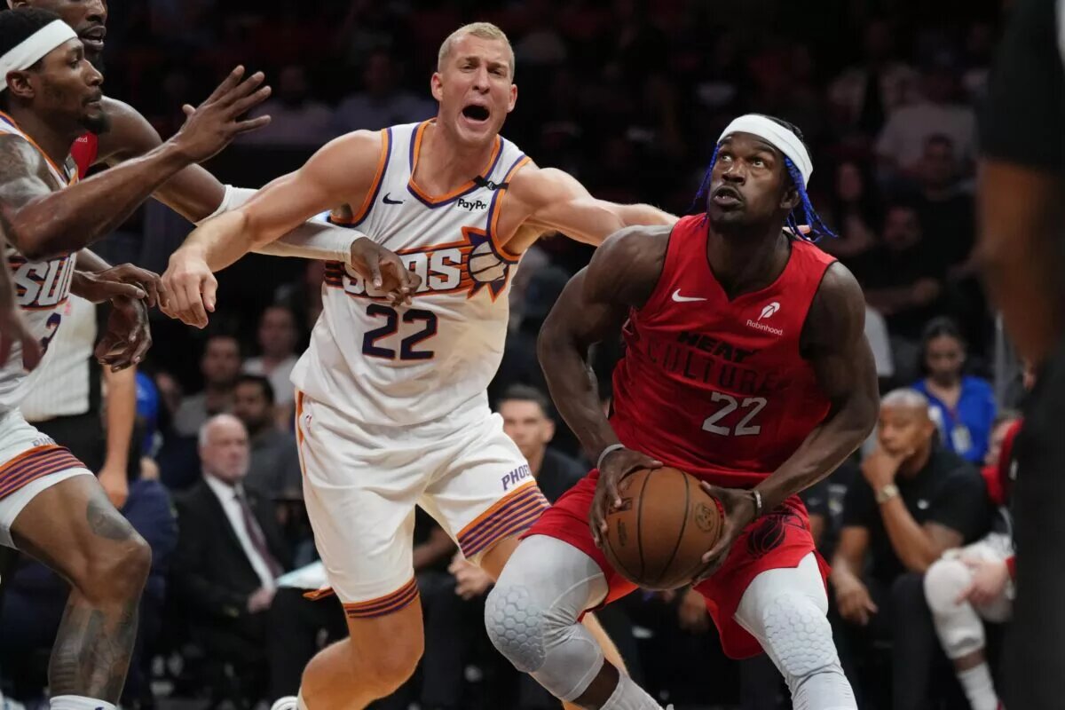 Miami Heat forward Jimmy Butler looks to score against Phoenix Suns defense