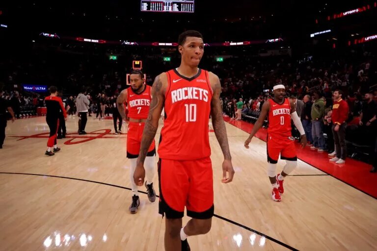 Houston Rockets forward Jabari Smith Jr (10) leaves the court following the game against the Miami Heat during the fourth quarter at Toyota Center.