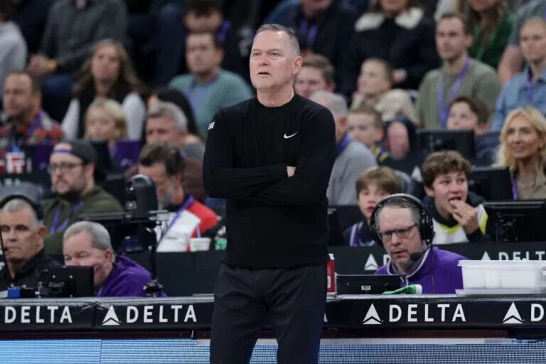 Denver Nuggets head coach Michael Malone watches from the sidelines during the first quarter against the Utah Jazz at Delta Center.