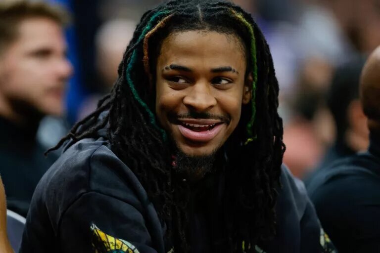 Memphis Grizzlies guard Ja Morant (12) smiles on the bench during the fourth quarter against the Sacramento Kings at Golden 1 Center.