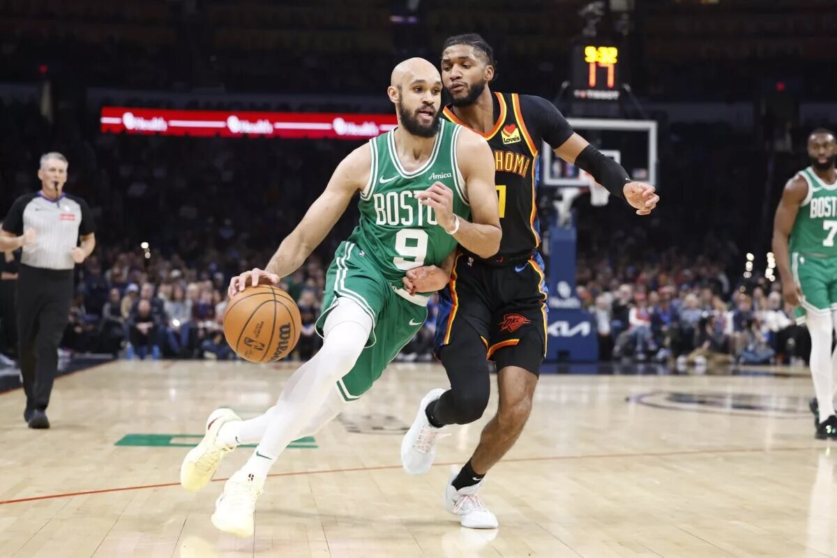 Jan 5, 2025; Oklahoma City, Oklahoma, USA; Boston Celtics guard Derrick White (9) drives around Oklahoma City Thunder guard Isaiah Joe (11) during the second quarter at Paycom Center.