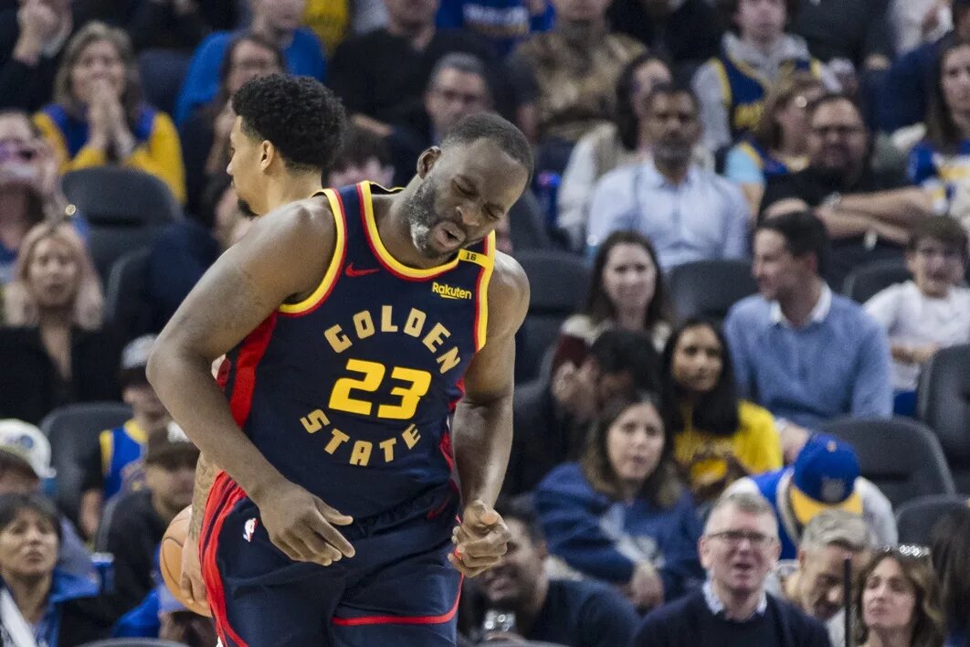 Golden State Warriors forward Draymond Green (23) reacts after missing a shot against the Miami Heat during the second quarter at Chase Center.
