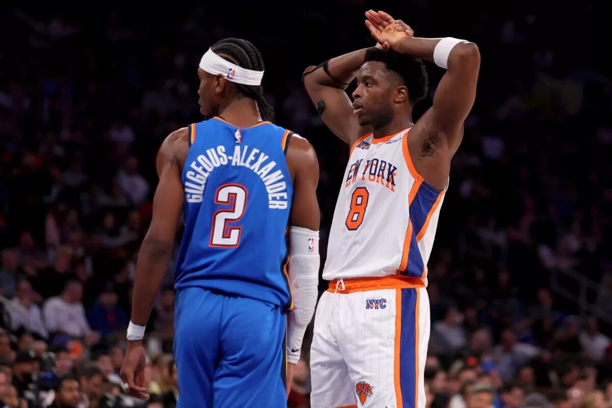 New York Knicks forward OG Anunoby (8) reacts during the third quarter against Oklahoma City Thunder guard Shai Gilgeous-Alexander (2) at Madison Square Garden.