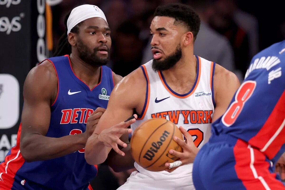 Jan 13, 2025; New York, New York, USA; New York Knicks center Karl-Anthony Towns (32) controls the ball against Detroit Pistons center Isaiah Stewart (28) during the third quarter at Madison Square Garden.