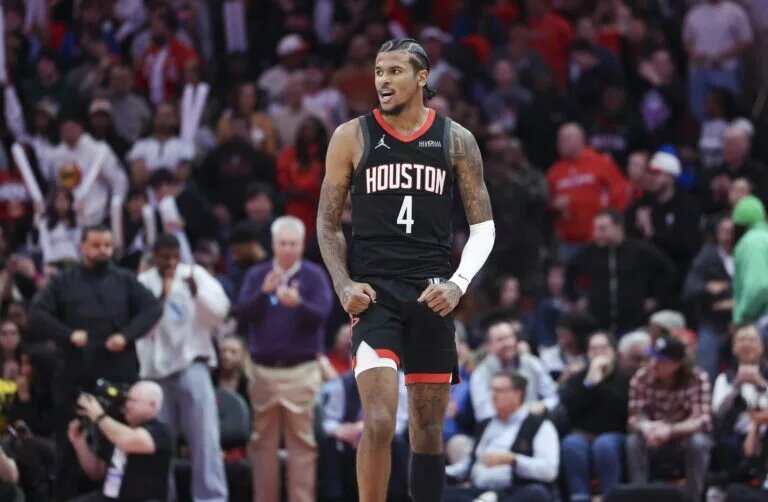 Jan 13, 2025; Houston, Texas, USA; Houston Rockets guard Jalen Green (4) reacts after a play during the second half against the Memphis Grizzlies at Toyota Center. Mandatory Credit: Troy Taormina-Imagn Images