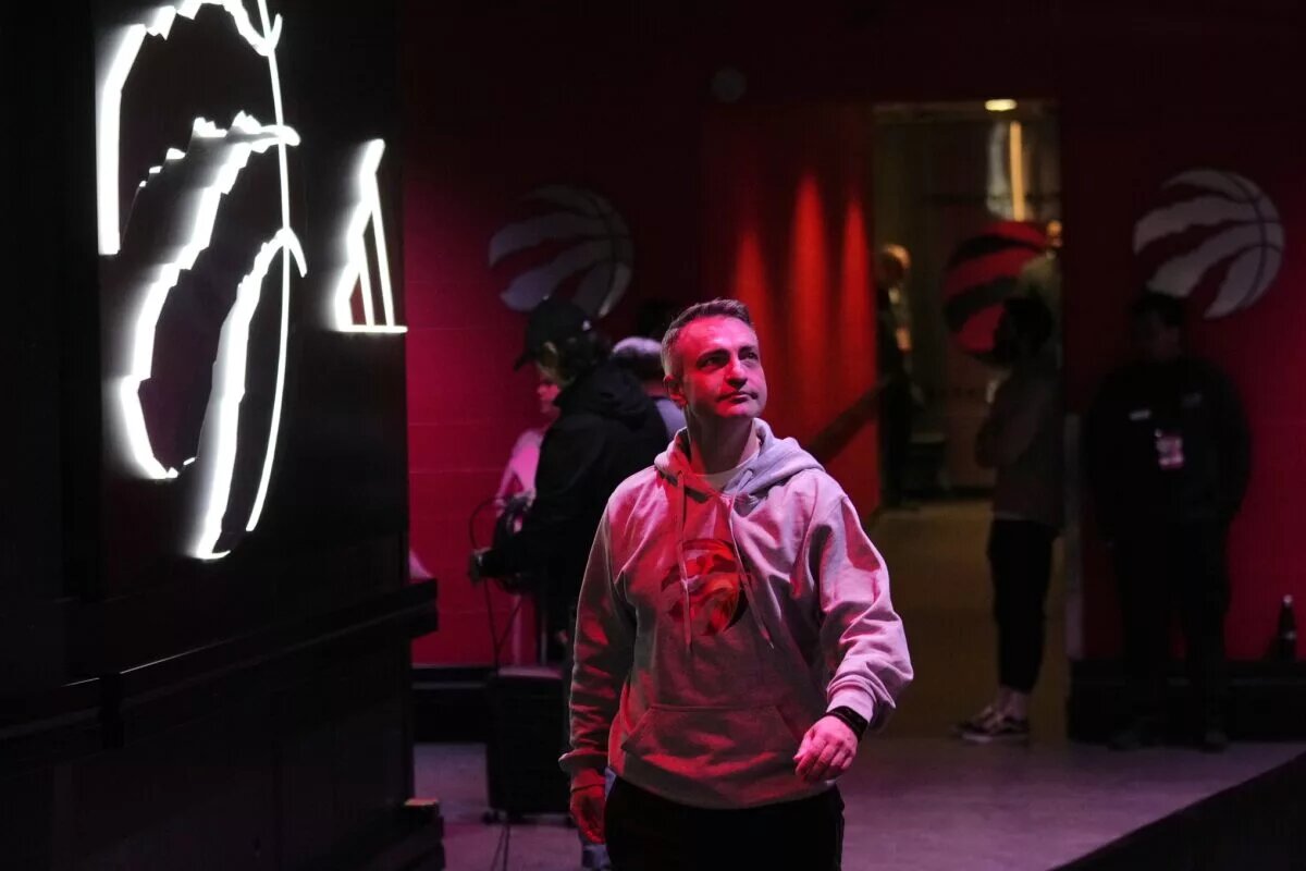 Jan 15, 2025; Toronto, Ontario, CAN; Toronto Raptors head coach Darko Rajakovic walks out to the court for warm ups before a game against the Boston Celtics at Scotiabank Arena. Mandatory Credit: John E. Sokolowski-Imagn Images