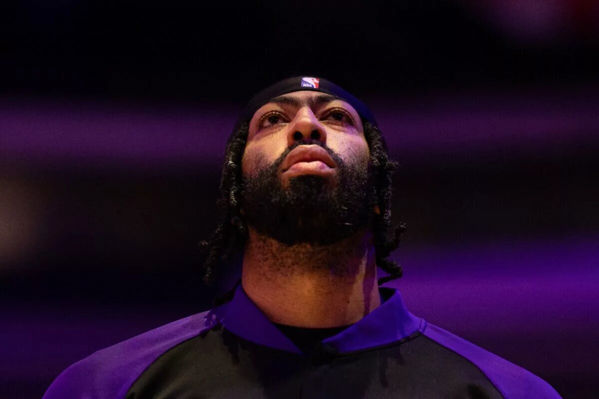 Jan 28, 2025; Philadelphia, Pennsylvania, USA; Los Angeles Lakers forward Anthony Davis stands for the anthem before action against the Philadelphia 76ers at Wells Fargo Center. Mandatory Credit: Bill Streicher-Imagn Images