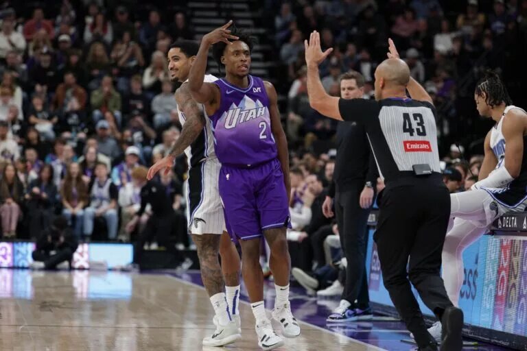 Utah Jazz guard Collin Sexton (2) celebrates a 3