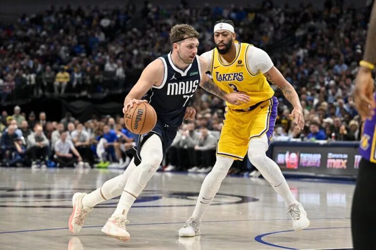 Dec 12, 2023; Dallas, Texas, USA; Dallas Mavericks guard Luka Doncic (77) and Los Angeles Lakers forward Anthony Davis (3) in action during the game between the Dallas Mavericks and the Los Angeles Lakers at the American Airlines Center. Mandatory Credit: Jerome Miron-USA TODAY Sports