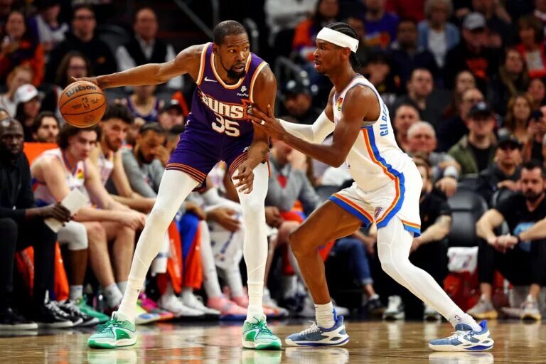 Phoenix Suns trade candidate Kevin Durant guarded by Oklahoma City Thunder leader Shai Gilgeous-Alexander