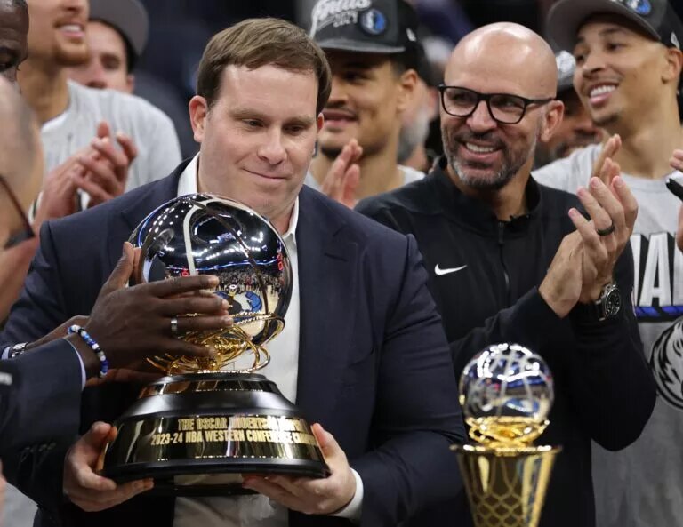 Dallas Mavericks owner/governor Patrick Dumont and head coach Jason Kidd celebrate
