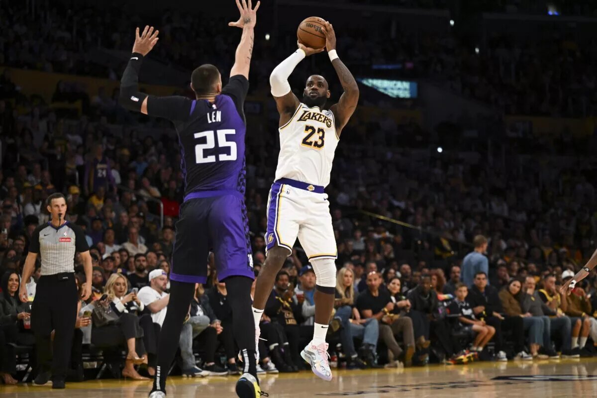 Oct 26, 2024; Los Angeles, California, USA; Los Angeles Lakers forward LeBron James (23) shoots against Sacramento Kings center Alex Len (25) during the second half at Crypto.com Arena. Mandatory Credit: Jonathan Hui-Imagn Images
