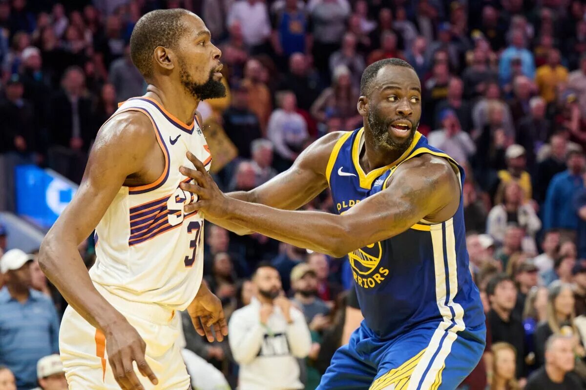 Phoenix Suns forward Kevin Durant guarded by Golden State Warriors forward Draymond Green