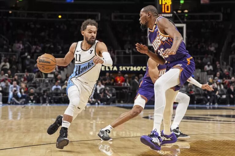 Atlanta Hawks point guard Trae Young defended by Phoenix Suns trade candidate Kevin Durant
