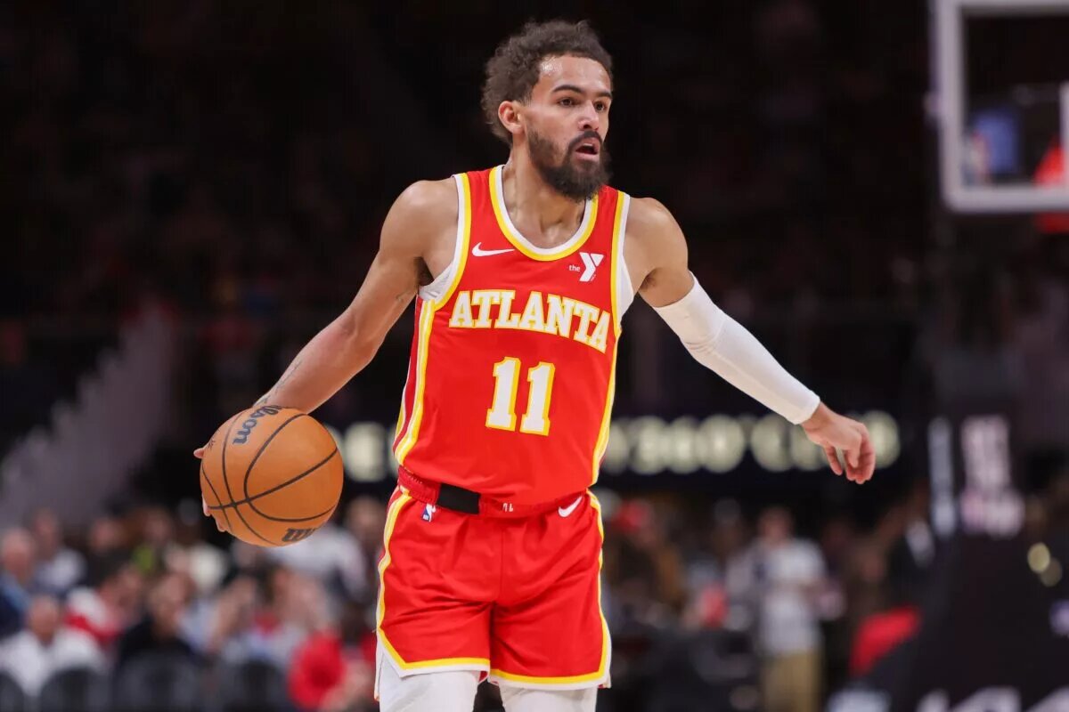 Feb 5, 2025; Atlanta, Georgia, USA; Atlanta Hawks guard Trae Young (11) dribbles against the San Antonio Spurs in the first quarter at State Farm Arena. Mandatory Credit: Brett Davis-Imagn Images
