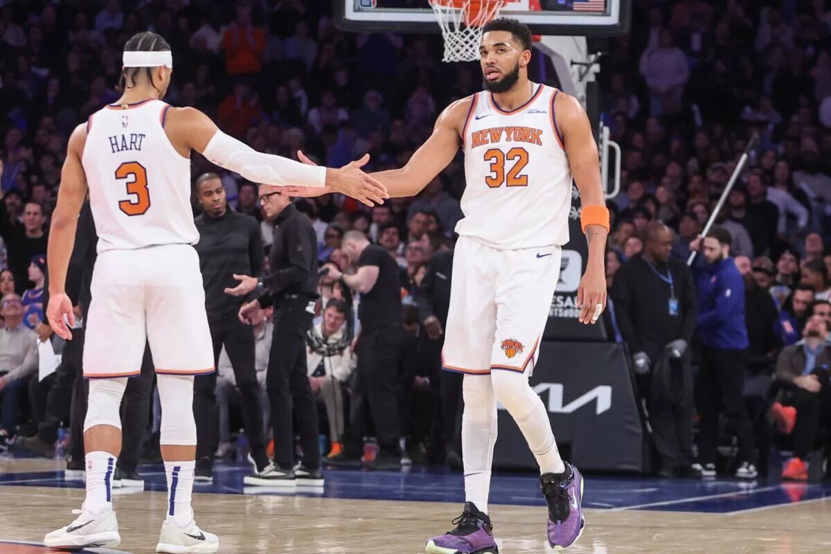 New York Knicks center Karl-Anthony Towns (32) is greeted by guard Josh Hart