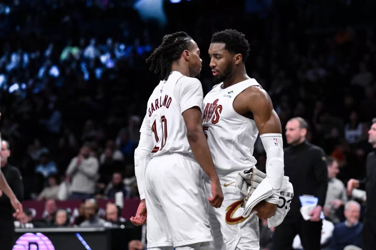 Cleveland Cavaliers guards Donovan Mitchell and Darius Garland chest bump