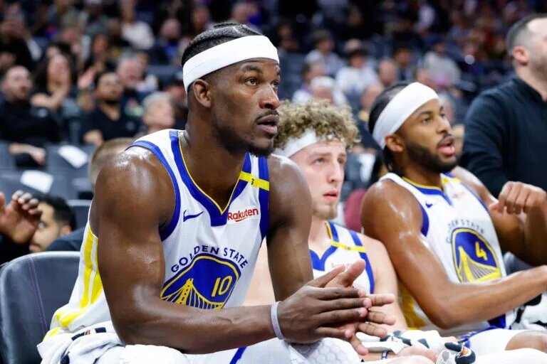 Feb 21, 2025; Sacramento, California, USA; Golden State Warriors forward Jimmy Butler III (10) claps from the bench during the fourth quarter against the Sacramento Kings at Golden 1 Center. Mandatory Credit: Sergio Estrada-Imagn Images