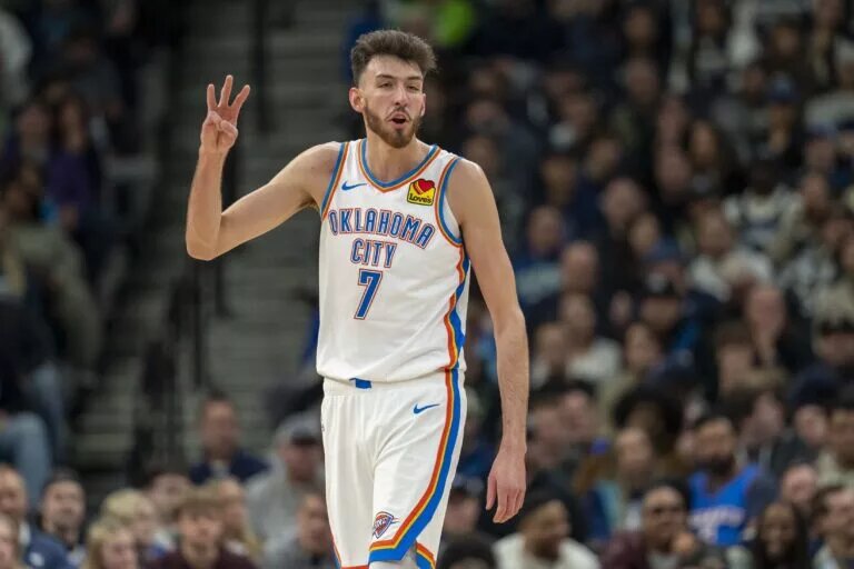 Feb 23, 2025; Minneapolis, Minnesota, USA; Oklahoma City Thunder forward Chet Holmgren (7) holds up three fingers during a free throw against the Minnesota Timberwolves in the first half at Target Center. Mandatory Credit: Jesse Johnson-Imagn Images
