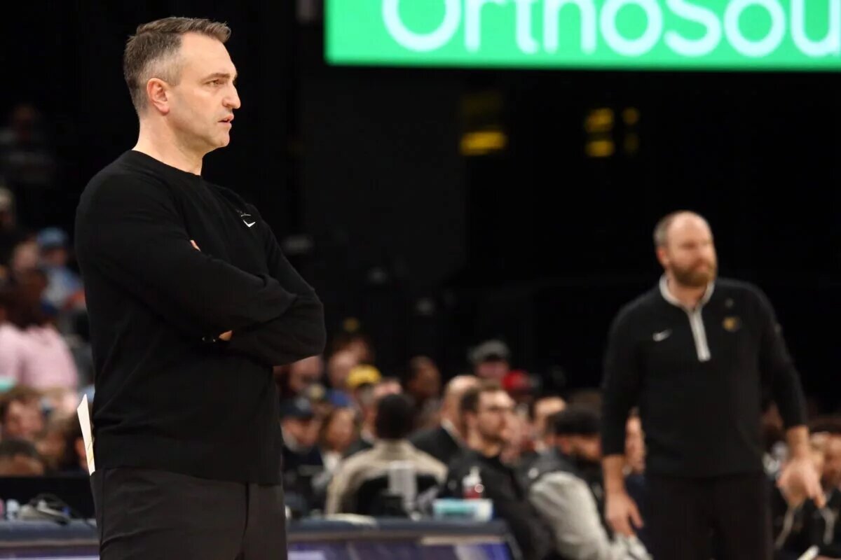 Toronto Raptors head coach Darko Rajakovic and Memphis Grizzlies head coach Taylor Jenkins