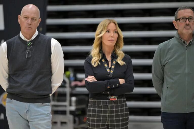 Jun 24, 2024; El Segundo, CA, USA; Jeannie Buss, controlling owner and president of the Los Angeles Lakers, stands with front office executives as they listen during the introductory news conference for new head coach JJ Redick at the UCLA Health Training Center. Mandatory Credit: Jayne Kamin-Oncea-USA TODAY Sports